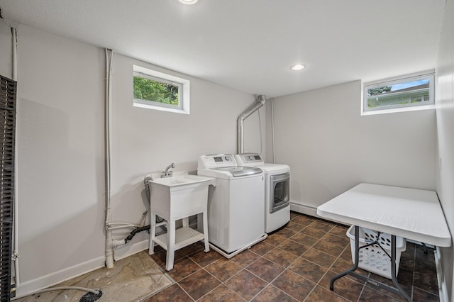 4824 Eriks Blvd, Eagan, MN 55122 - laundry room featuring washer and clothes dryer, healthy amount of natural light, recessed lighting, and baseboards