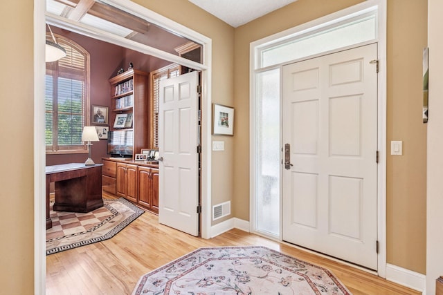 130 Stonebridge Rd, Lilydale, MN 55118 - foyer featuring light wood finished floors and baseboards