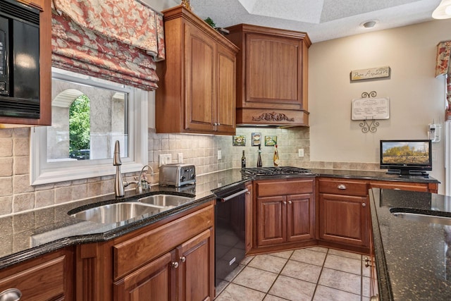 130 Stonebridge Rd, Lilydale, MN 55118 - kitchen with a sink, black dishwasher, gas stovetop, light tile patterned flooring, and brown cabinets