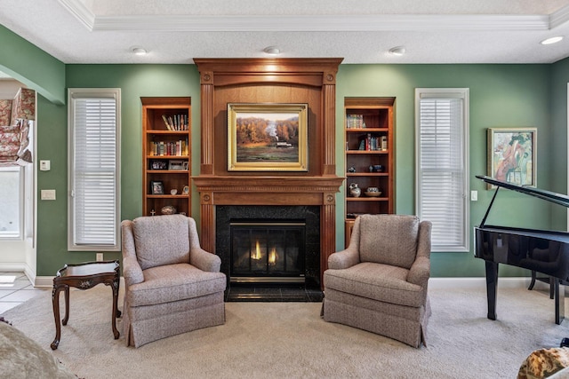 130 Stonebridge Rd, Lilydale, MN 55118 - sitting room with carpet floors, a high end fireplace, crown molding, and baseboards
