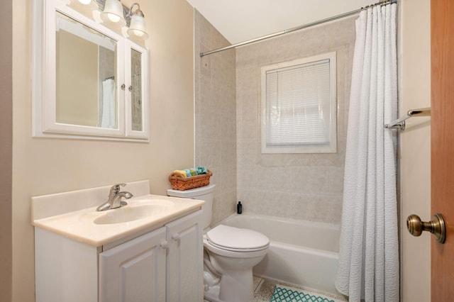 bathroom featuring toilet, vanity, and shower / bath combination with curtain