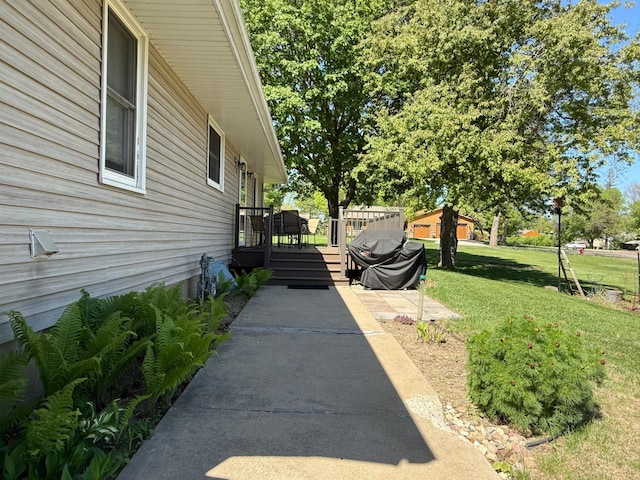 view of patio / terrace featuring a wooden deck