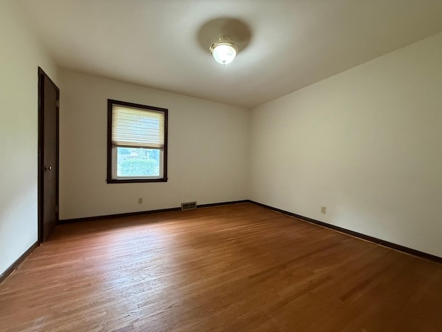 421 Oxford St W, Worthington, MN 56187 - unfurnished room with light wood finished floors and baseboards