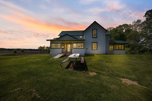 3592 Blom Lake Dr, Frederic, WI 54837 - back of property with a yard and metal roof