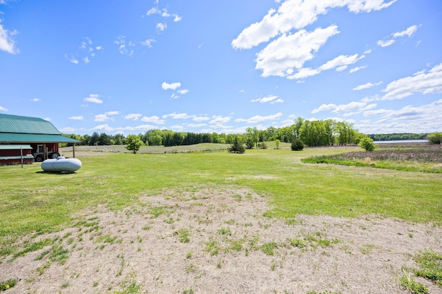 3592 Blom Lake Dr, Frederic, WI 54837 - view of green lawn featuring a rural view