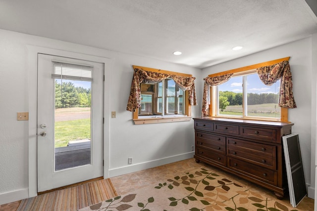 3592 Blom Lake Dr, Frederic, WI 54837 - entryway with baseboards, healthy amount of natural light, and recessed lighting