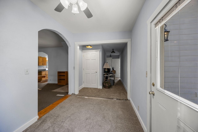 3592 Blom Lake Dr, Frederic, WI 54837 - hallway featuring carpet floors, baseboards, and arched walkways