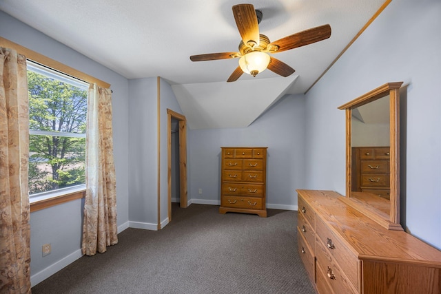 3592 Blom Lake Dr, Frederic, WI 54837 - bedroom with carpet, vaulted ceiling, baseboards, and ceiling fan