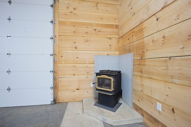 3592 Blom Lake Dr, Frederic, WI 54837 - detailed view of a wood stove and concrete floors