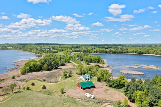 3592 Blom Lake Dr, Frederic, WI 54837 - drone / aerial view of a heavily wooded area and a nearby body of water