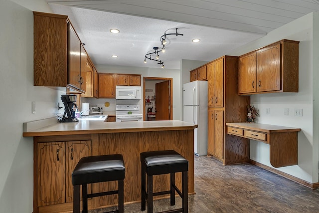 28443 133rd St NW, Baldwin Twp, MN 55398 - kitchen featuring white appliances, a peninsula, light countertops, brown cabinetry, and a textured ceiling