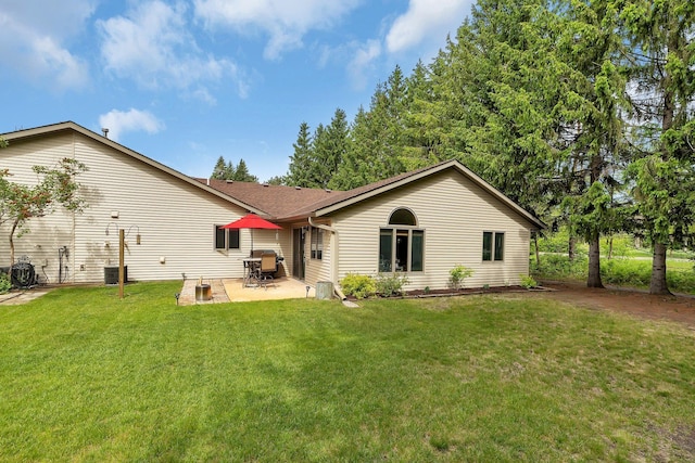 28443 133rd St NW, Baldwin Twp, MN 55398 - rear view of property with a lawn, a patio, a shingled roof, and cooling unit