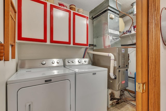 28443 133rd St NW, Baldwin Twp, MN 55398 - laundry room featuring cabinet space and washing machine and dryer