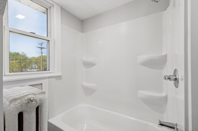 full bathroom with shower / tub combination