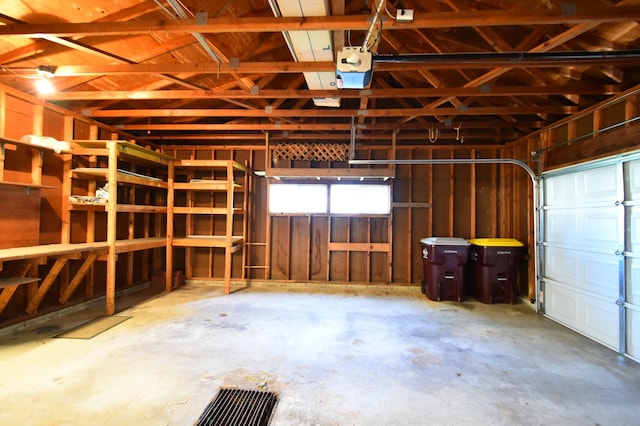 536 3rd Ave, Wanamingo, MN 55983 - garage featuring a garage door opener