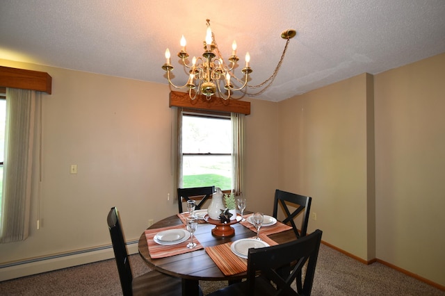 536 3rd Ave, Wanamingo, MN 55983 - dining area with a baseboard radiator, a chandelier, carpet flooring, a textured ceiling, and baseboards