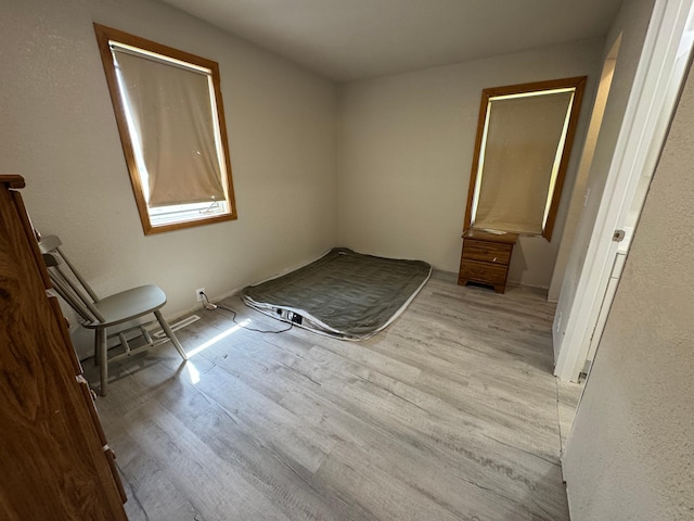 709 Center St E, Roseau, MN 56751 - unfurnished bedroom with wood finished floors