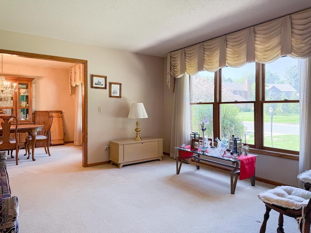1626 Diane Rd, Mendota Heights, MN 55118 - sitting room featuring light carpet, plenty of natural light, a chandelier, and a textured ceiling