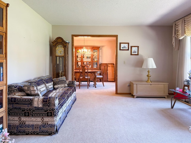 1626 Diane Rd, Mendota Heights, MN 55118 - living room featuring a chandelier, light colored carpet, and a textured ceiling