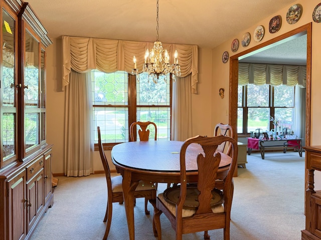 1626 Diane Rd, Mendota Heights, MN 55118 - dining area featuring light carpet and a chandelier