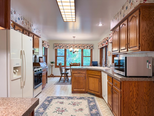 1626 Diane Rd, Mendota Heights, MN 55118 - kitchen with white appliances, a sink, light floors, a peninsula, and recessed lighting