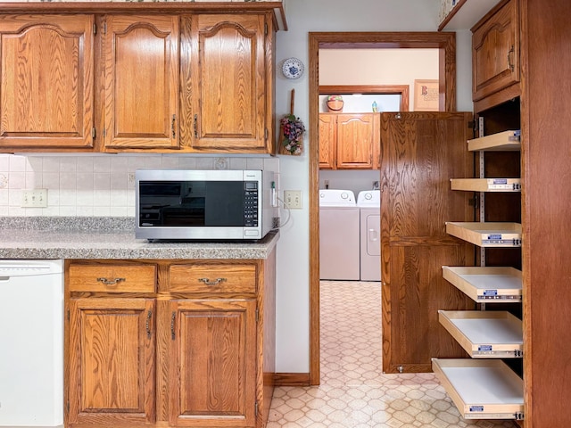 1626 Diane Rd, Mendota Heights, MN 55118 - kitchen featuring stainless steel microwave, dishwasher, separate washer and dryer, open shelves, and light flooring