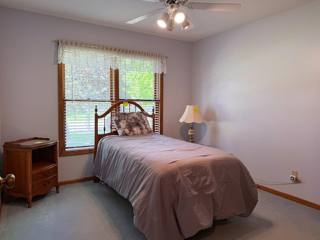1626 Diane Rd, Mendota Heights, MN 55118 - carpeted bedroom featuring baseboards, multiple windows, and a ceiling fan
