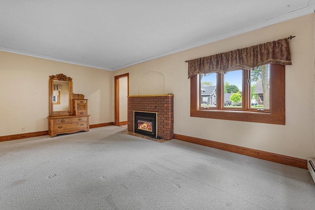 209 Main St, Arlington, MN 55307 - unfurnished living room featuring crown molding, baseboards, a brick fireplace, and carpet flooring