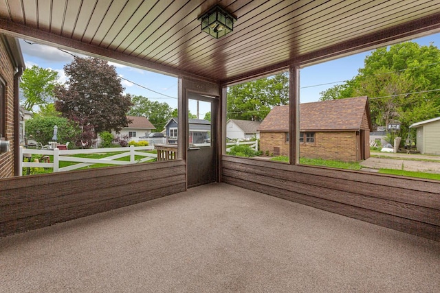 209 Main St, Arlington, MN 55307 - unfurnished sunroom with a residential view