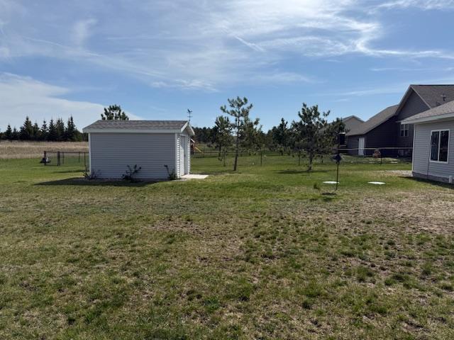 2008 Whiting Rd NW Unit 26, Bemidji, MN 56601 - view of yard with an outbuilding