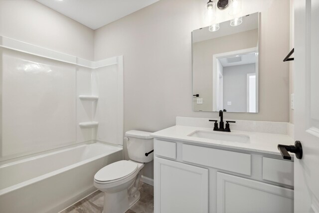 12608 Erskin St NE, Blaine, MN 55449 - bathroom with toilet, vanity, and tub / shower combination