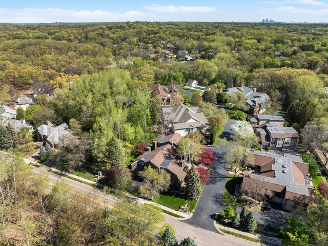 7676 Woodview Ct, Edina, MN 55439 - aerial view of residential area with a forest
