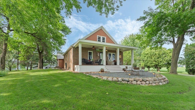 12586 220th St, Silver Lake, MN 55381 - view of front of property featuring a front yard, brick siding, a ceiling fan, and a porch