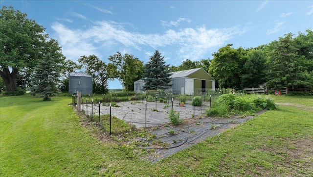 12586 220th St, Silver Lake, MN 55381 - view of yard with an outdoor structure, a pole building, and a garden