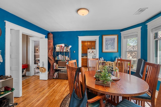 1123 5th St NE, Minneapolis, MN 55413 - dining room featuring light wood-style flooring