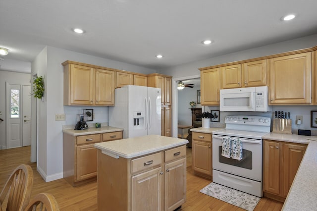 19062 180th Ave NW, Big Lake, MN 55309 - kitchen featuring white appliances, light countertops, light wood-type flooring, light brown cabinets, and recessed lighting