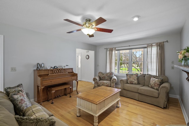 19062 180th Ave NW, Big Lake, MN 55309 - living room with ceiling fan, light wood-style flooring, and baseboards