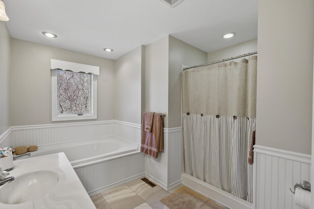 19062 180th Ave NW, Big Lake, MN 55309 - bathroom featuring a wainscoted wall, a sink, a bath, curtained shower, and tile patterned flooring