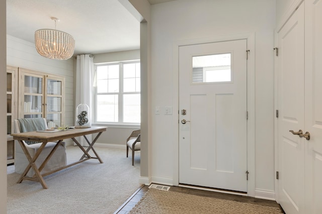 19530 102nd, Corcoran, MN 55374 - entrance foyer with a chandelier, baseboards, and light colored carpet