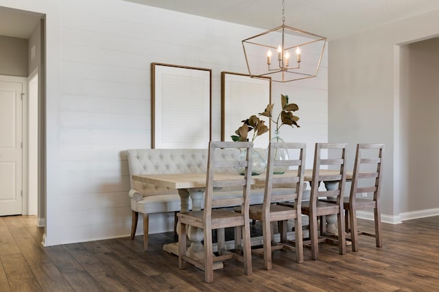 19530 102nd, Corcoran, MN 55374 - dining room featuring wood finished floors, a chandelier, wooden walls, and baseboards