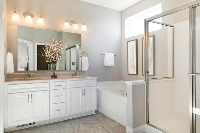 19530 102nd, Corcoran, MN 55374 - bathroom with a bath, a stall shower, double vanity, and a chandelier