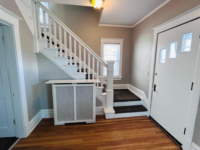 1536 Concordia Ave, Saint Paul, MN 55104 - entryway with wood finished floors, stairway, crown molding, and baseboards