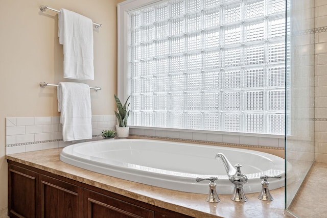 full bathroom featuring a garden tub
