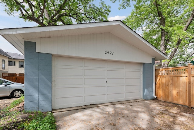 detached garage with fence