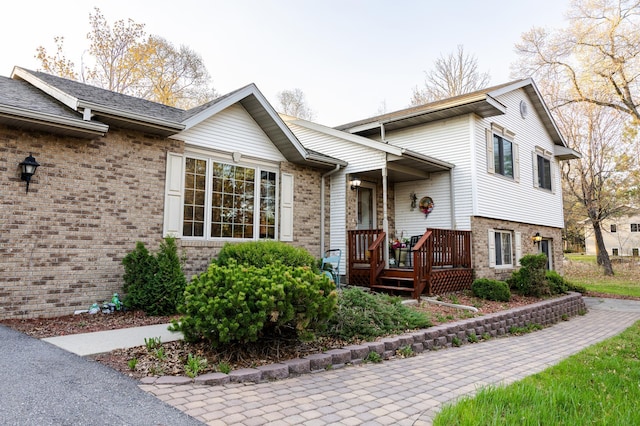 view of front of house with brick siding