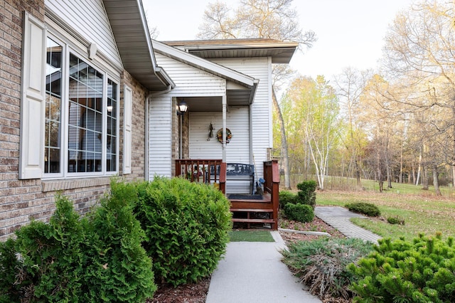 entrance to property with brick siding