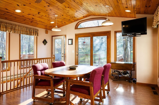 dining space featuring vaulted ceiling, wood ceiling, wood finished floors, recessed lighting, and baseboards