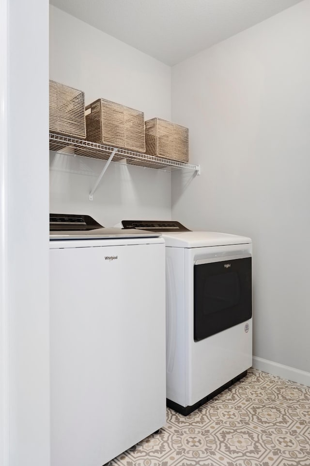 14447 103rd Pl N, Maple Grove, MN 55369 - washroom with independent washer and dryer and baseboards