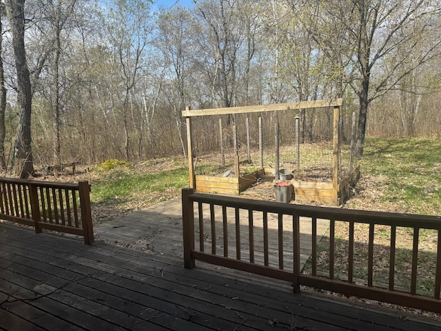 7525 Filbert Ln NE, Turtle River Twp, MN 56601 - wooden deck featuring a garden