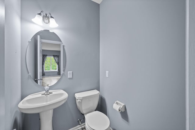 half bathroom with toilet